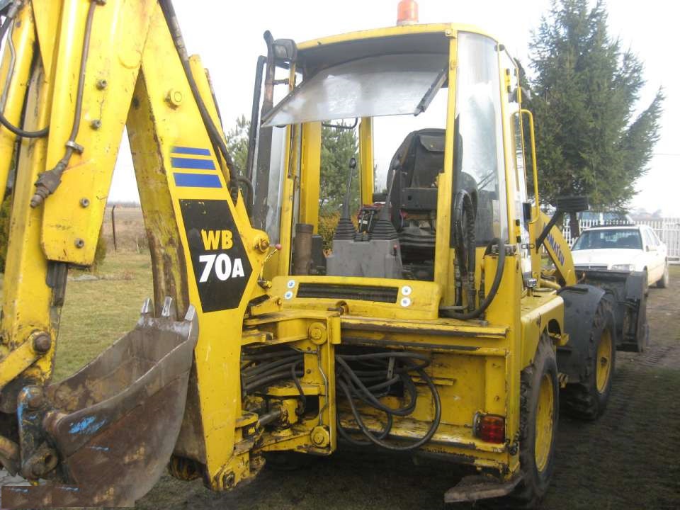 KOMATSU WB 70 części zamienne